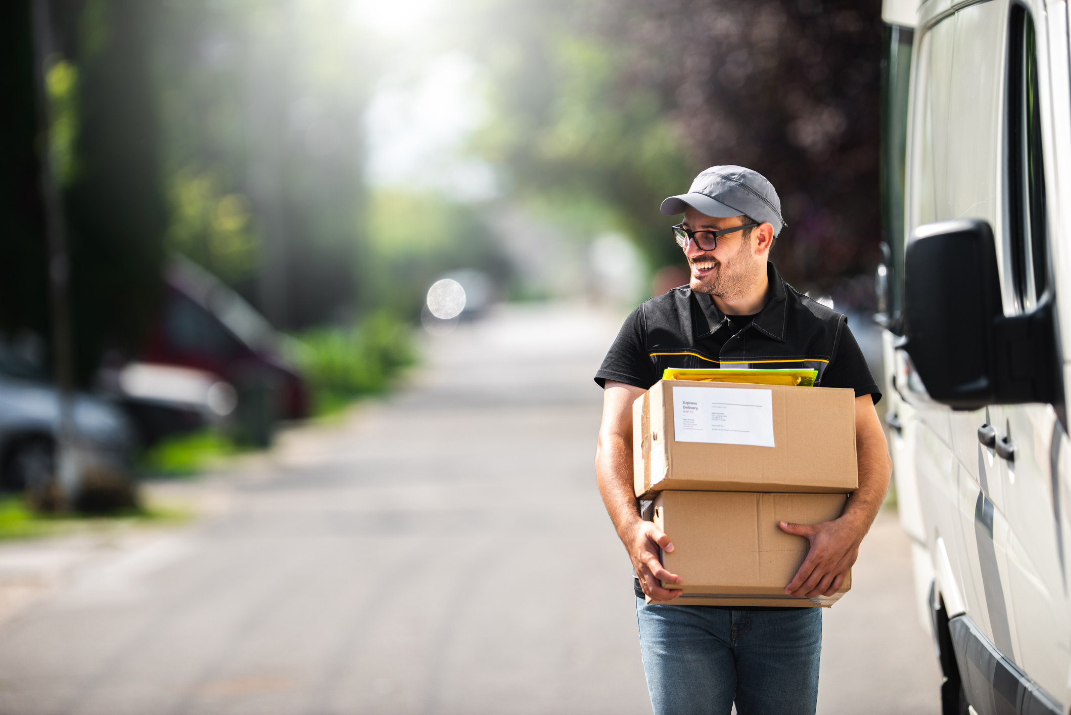 a-delivery-person-holding-packages.jpg